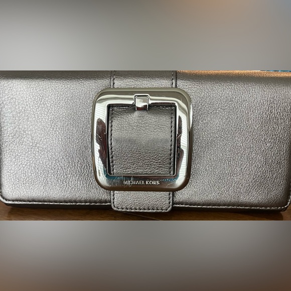 Michael Kors Handbags - Michael Kors Gunmetal Clutch Purse Sutton Leather RARE Excellent Condition